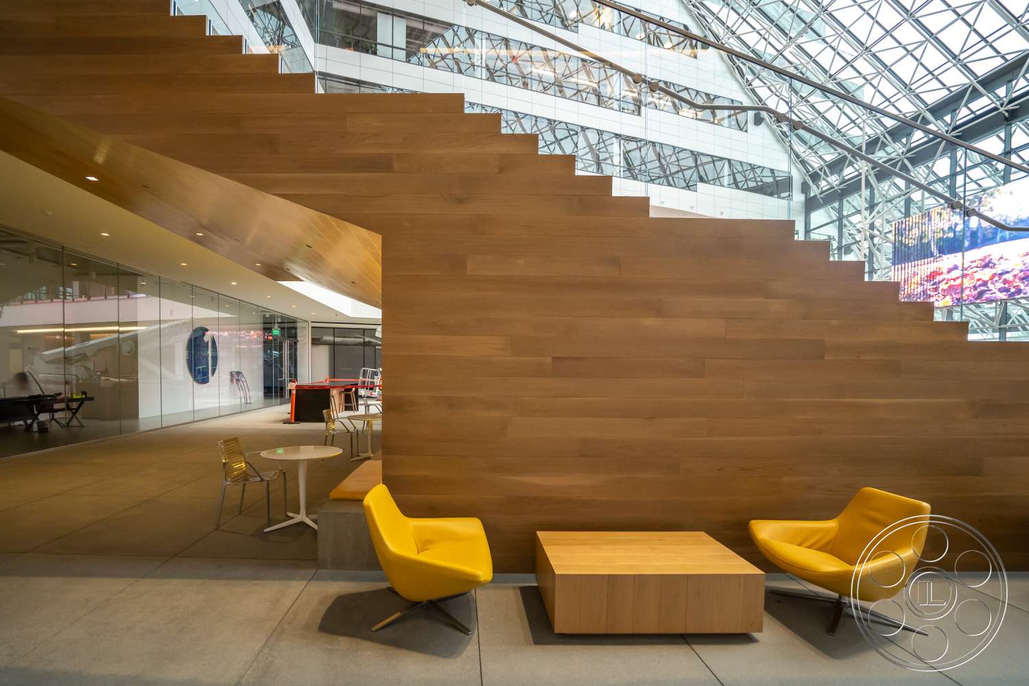 The Atrium - indoors, wood, furniture, table, room, lobby, living room, plywood, chair, hardwood, staircase