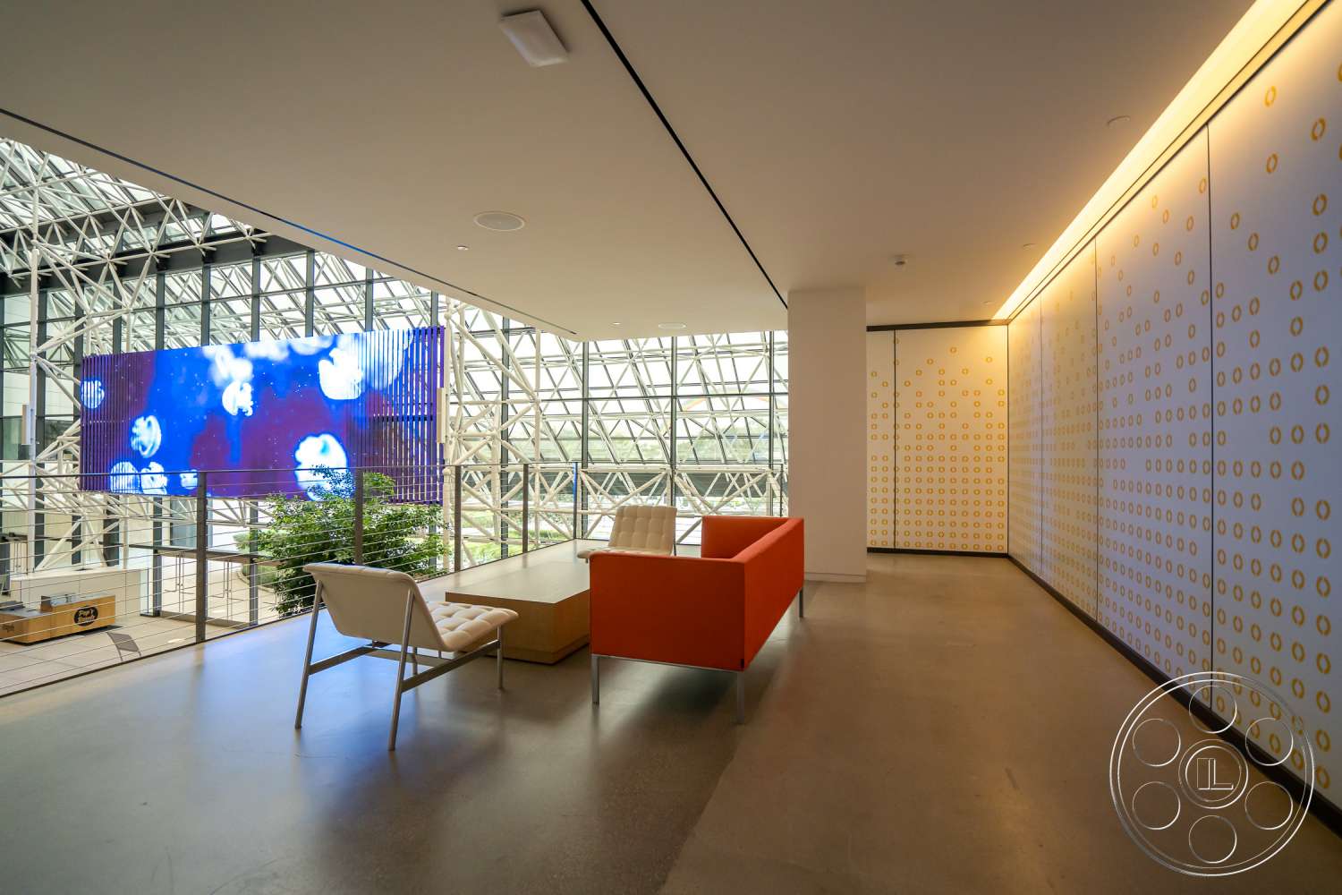 The Atrium - indoors, lighting, wood, furniture, table, room, lobby, living room, couch, chair, hardwood