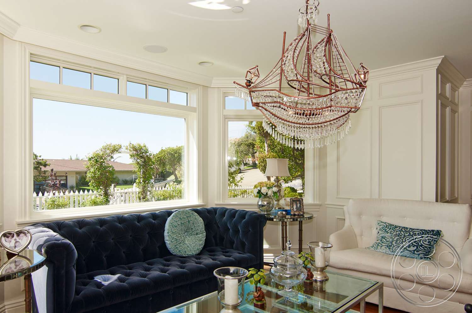 Cape Cod 4 - indoors, furniture, table, room, lobby, living room, couch, coffee table, waiting room, reception, reception room, lamp, chandelier