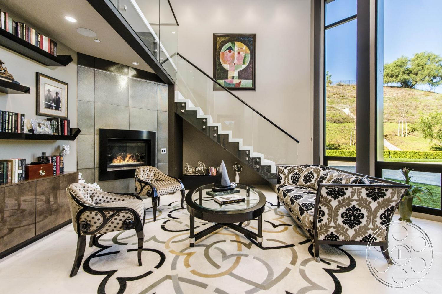 Mansion 126 - Indoors, Room, Furniture, Living Room, fireplace, Table, Coffee Table, library, stairs