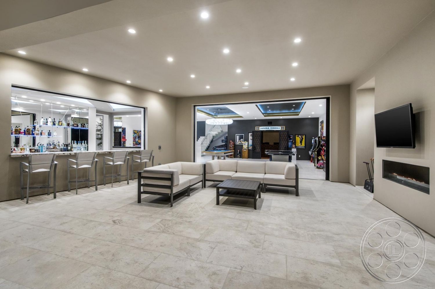 Mansion 126 - fireplace, bar, couch, coffee table, slate, television, counter stools