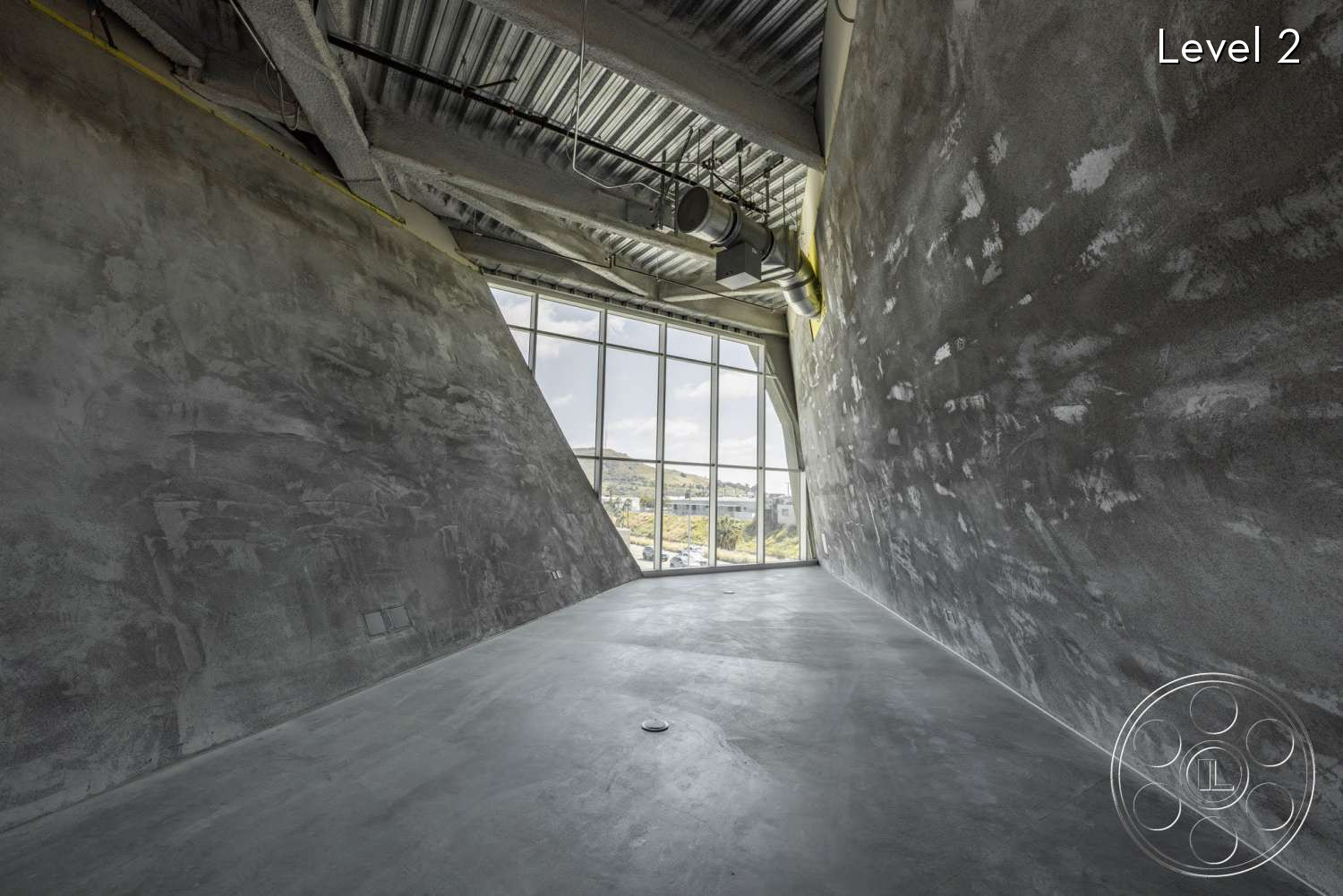 The Wrapper Building - lobby, windows, concrete