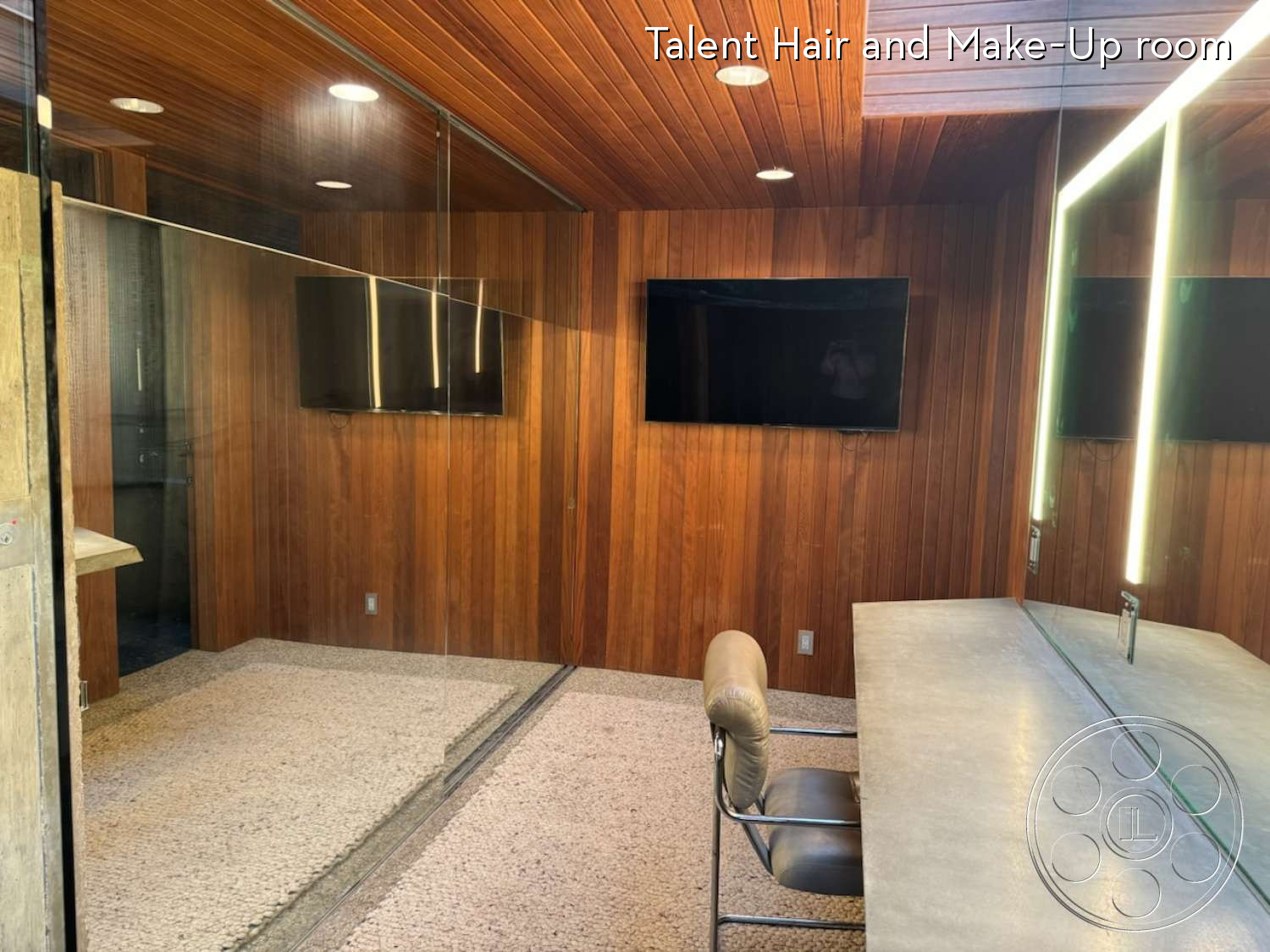 Goldstein House - wood panel, hair and makeup room, wall-mounted television, vanity station