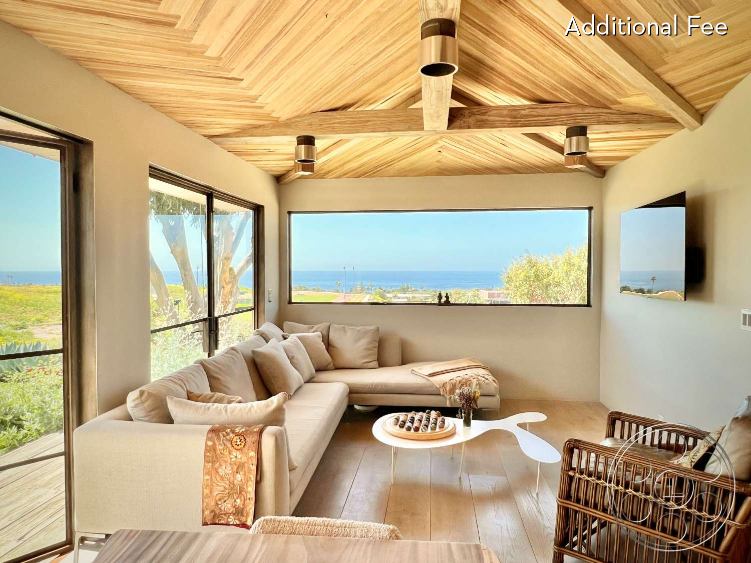 Zen Garden - Living Room, Coffee Table, couch, wood ceiling, Ceiling Fan, wall-mounted television