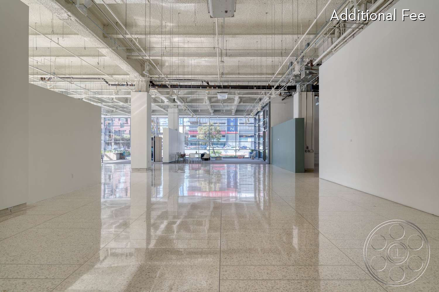 SKYstudio® - large windows, white walls, open space, high ceilings, natural light, minimalist decor, modern architecture, polished concrete floor, industrial design, functional lighting, gallery space, urban aesthetic, commercial space, neutral colors, exposed pipes, concrete finish, versatile layout, flexible environment, future-ready design