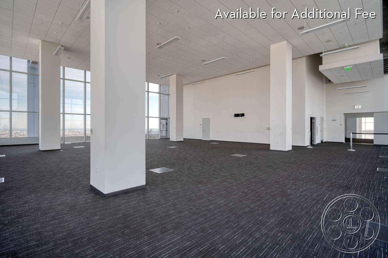 SKYstudio® - large windows, white walls, open space, high ceilings, natural light, modern architecture, minimalist design, black accents, contemporary style, ambient lighting, flexible layout, gray carpet, commercial space, urban view, blank canvas, meeting area, column structure, office environment, elevator access