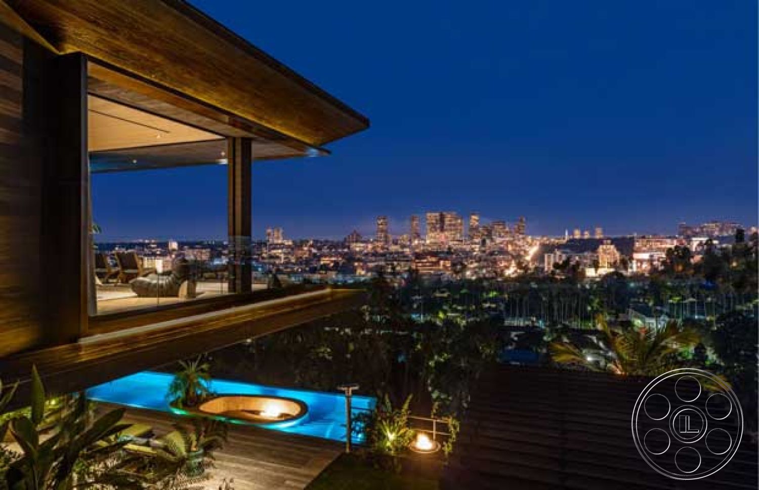 Modern 507 - minimalist design elements, outdoor seating area, natural wood finishes, modern architectural style, city skyline view, contemporary outdoor lighting, open concept living space, lush tropical landscaping, panoramic city views, infinity edge pool, nighttime illumination, exterior wooden deck, floor-to-ceiling glass windows, rectangular pool with spa, overhanging wood eaves, reinforced concrete foundation, steel and glass balcony railings, organic shapes in landscaping, colorful urban backdrop, floating terrace, built-in outdoor fire feature