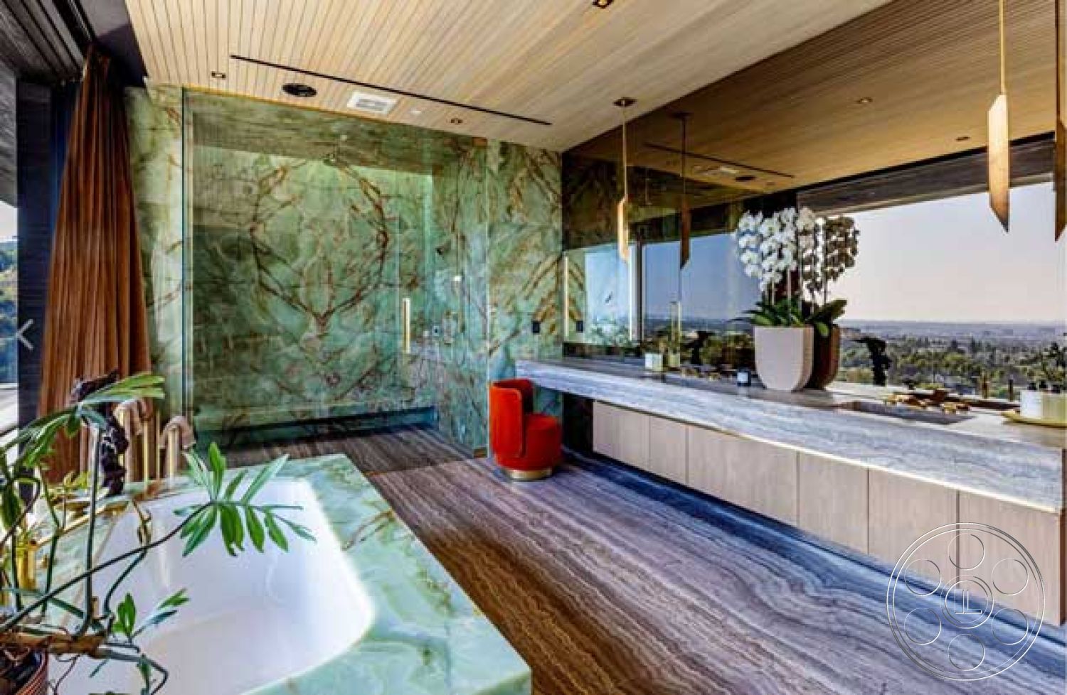 Modern 507 - glass shower enclosure, minimalist design elements, modern pendant lighting, interior bathroom design, freestanding soaking tub, marble countertop vanity, green onyx wall panels, wood ceiling slats, floating bathroom vanity, luxury bathroom decor, valley view from bathroom, plush red accent chair, large format stone flooring, decorative planter with orchids, high-end fixtures and finishes