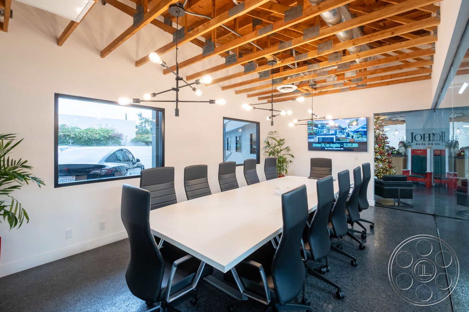 Office 126 - conference room, open floor plan, large glass windows, natural light, metal accents, green indoor plants, exposed wood ceiling beams, white painted walls, concrete floor finish, ergonomic office chairs, contemporary furniture design, modern conference table, industrial style interior, interior conference room, minimalist lighting fixtures, modern glass door, digital display screen