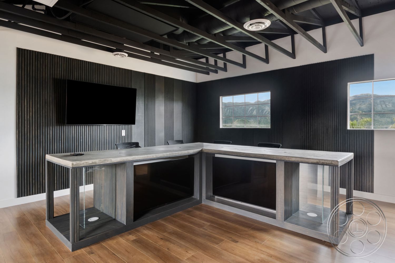 Office 126 - floor-to-ceiling windows - interior, exposed wood beam ceiling - interior, concrete reception desk - interior, glass front panel - interior, dark wood wall paneling - interior, hardwood flooring - interior, vertical slatted wall treatment - interior, modern minimalist design - interior, integrated TV mount - interior, contemporary office space - interior