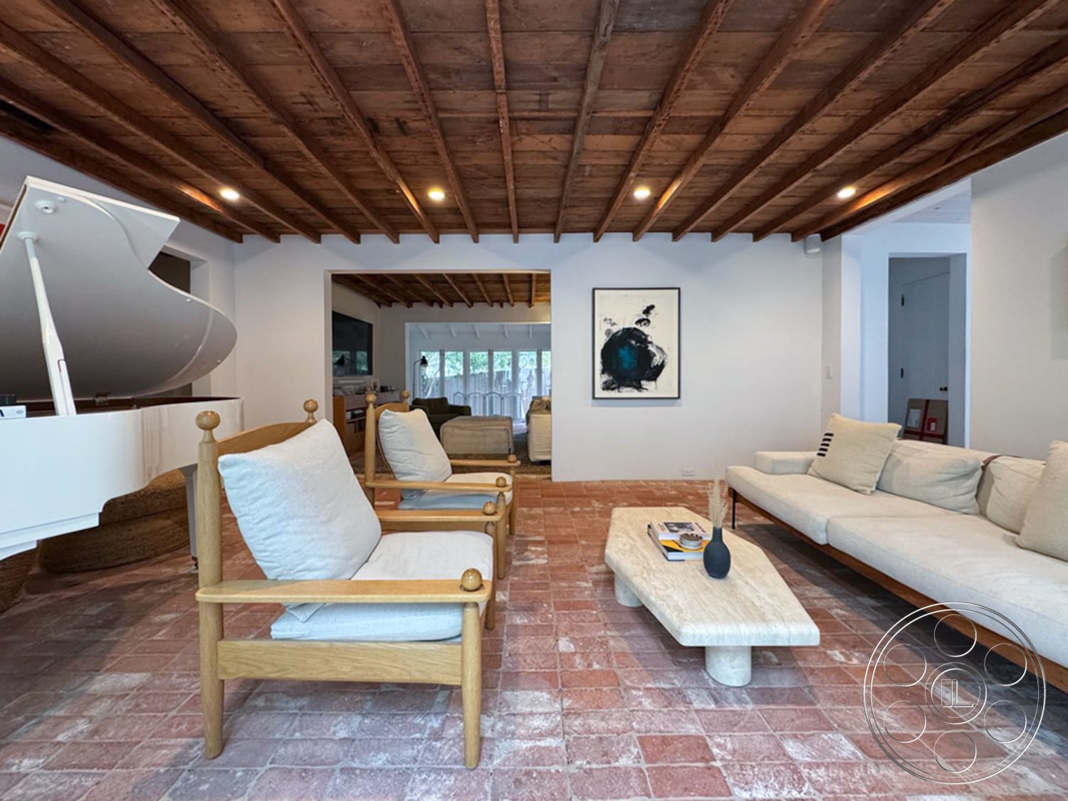 Spanish 165 - neutral color palette, textured wall art, cozy seating arrangement, open concept living space, contemporary coffee table, indoor plant decor, wooden accent chairs, exposed wood beam ceiling, brick flooring in living room, modern minimalist sofa, natural light-filled interior, bright airy atmosphere, functional living room layout, artistic home decor elements