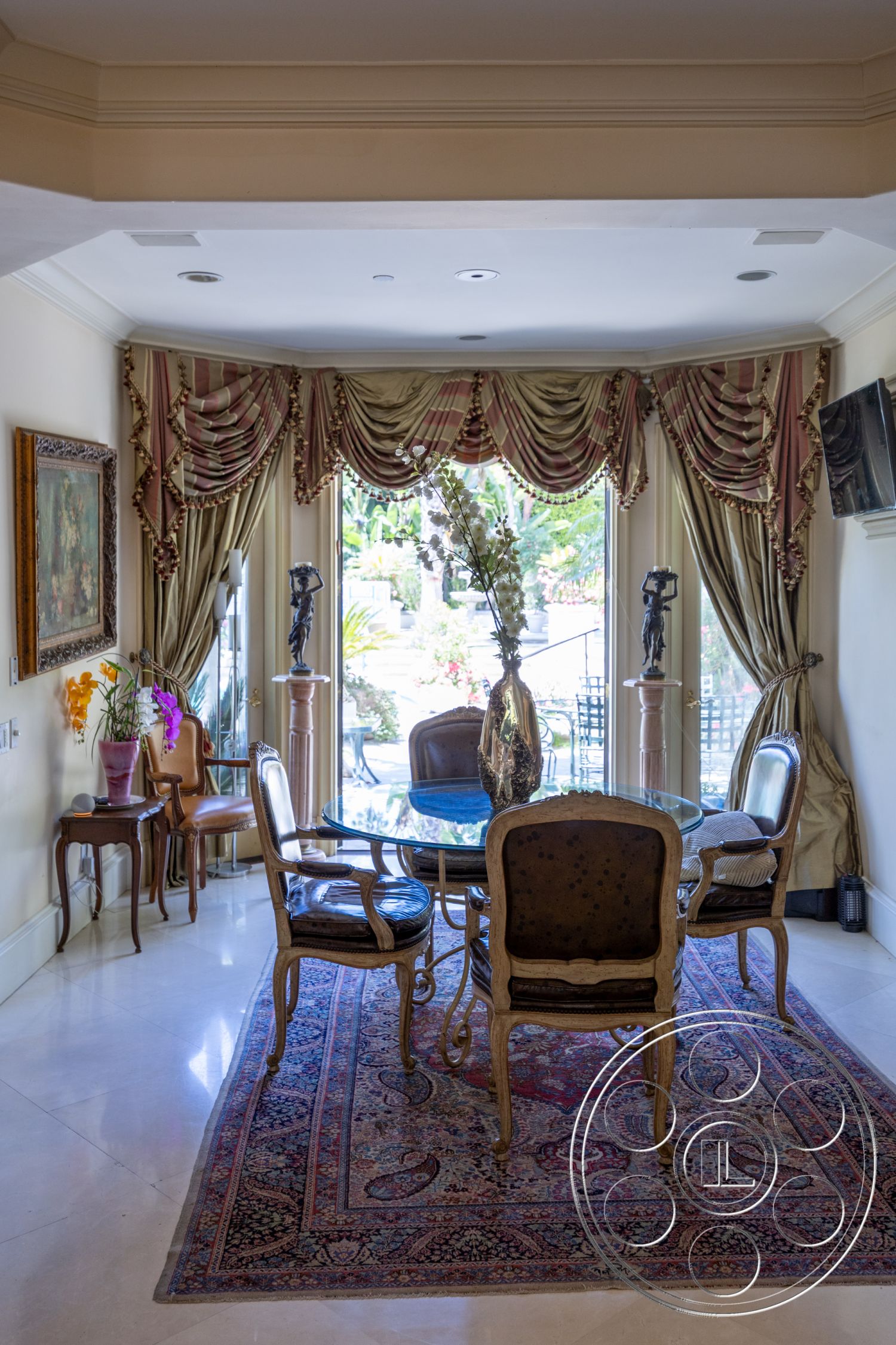Medit 165 - decorative vases, bright natural light, upholstered dining chairs, floor-to-ceiling windows, glass dining table, polished marble flooring, ornate area rug, traditional design elements, stylish wall art, interior dining area, crown molding ceiling, luxurious drapery, elegant column details