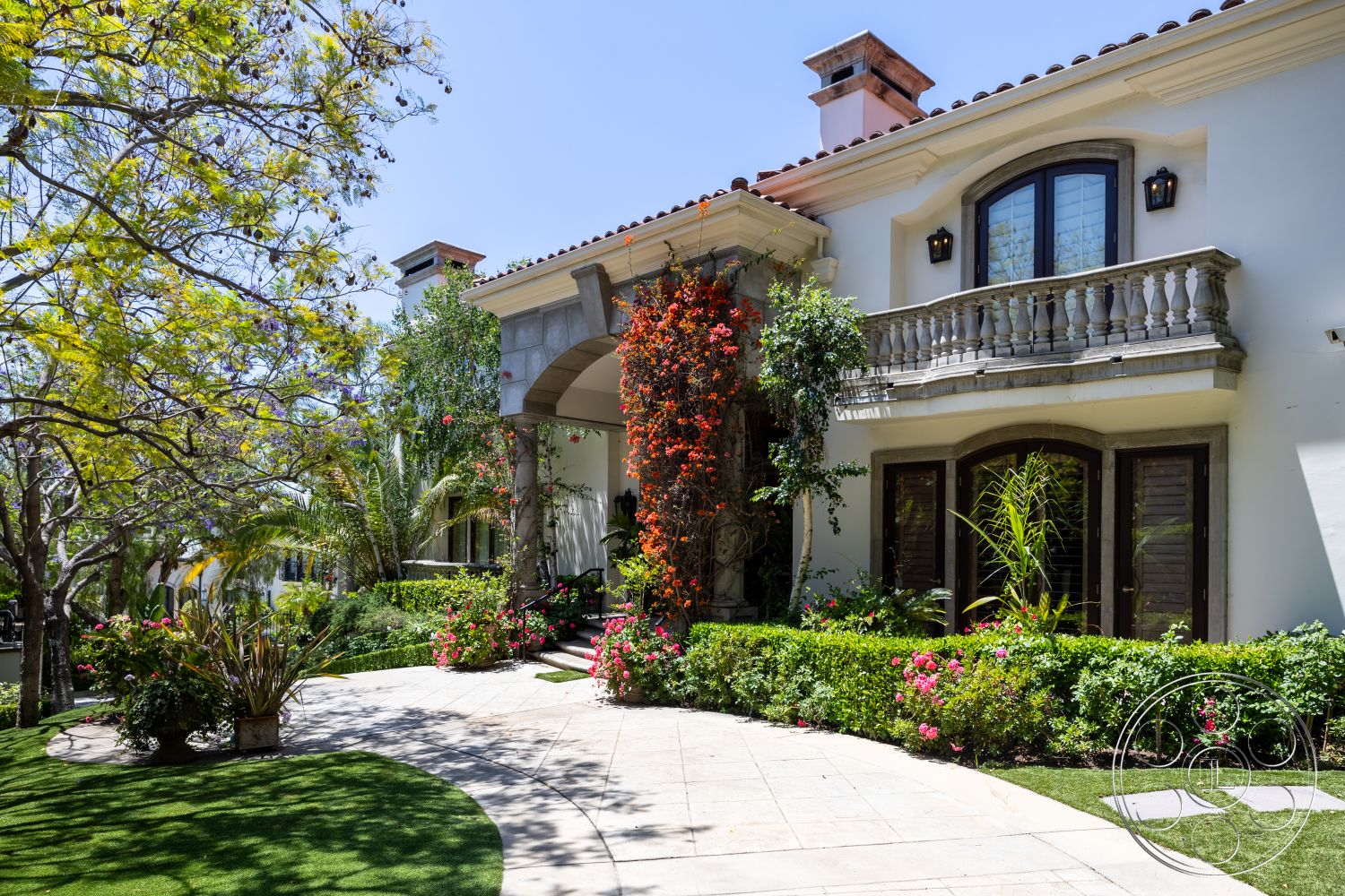 Medit 165 - exterior stucco walls, exterior landscaped garden, exterior stone feature wall, exterior manicured lawn, exterior palm trees, exterior wrought iron lanterns, exterior outdoor seating area, exterior concrete pathway, exterior wooden balcony railing, exterior terracotta roof tiles, exterior colorful flower beds, exterior glass panel entry doors, exterior arched entryway, exterior decorative stone columns, exterior paver stone walkway