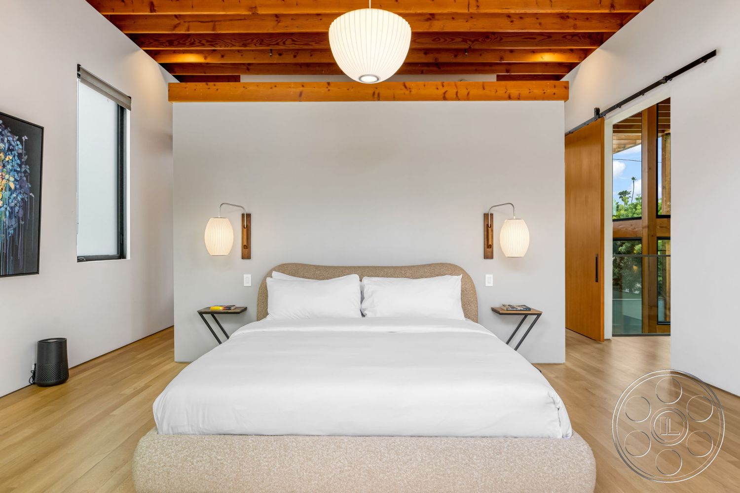 Modern 508 - neutral color palette, minimalist design, open floor plan, artistic wall decor, modern pendant lighting, sliding glass door, textured plaster walls, exposed wood ceiling beams, hardwood bedroom floors, contemporary bedroom