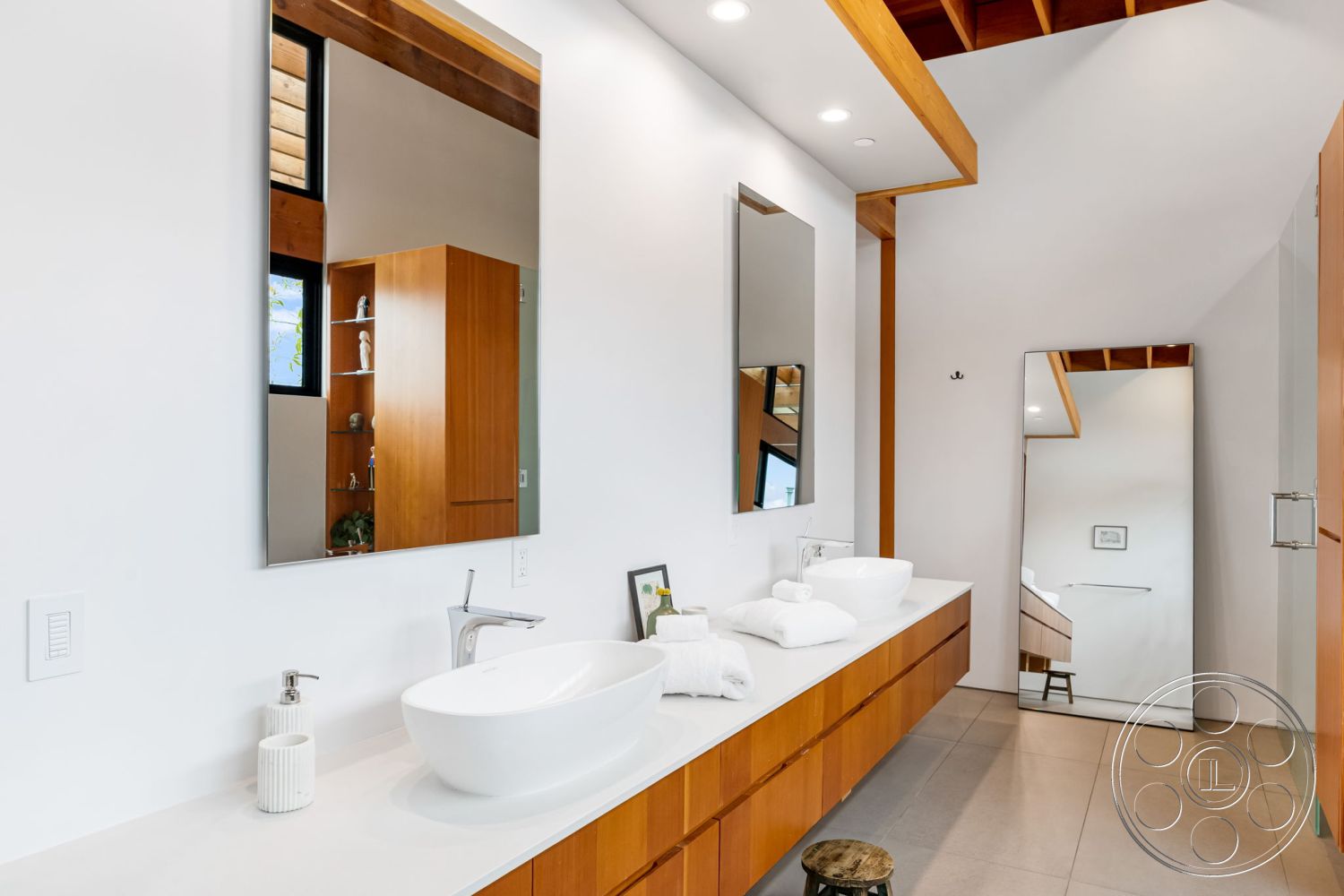 Modern 508 - natural wood cabinetry, white quartz countertop, interior bathroom design, recessed lighting fixtures, contemporary bathroom style, exposed wooden ceiling beams, framed glass shower enclosure, minimalist design aesthetics, floating vessel sinks, linear wall mirrors, neutral tile flooring, open shelving for storage, large format porcelain tiles, spacious and airy layout