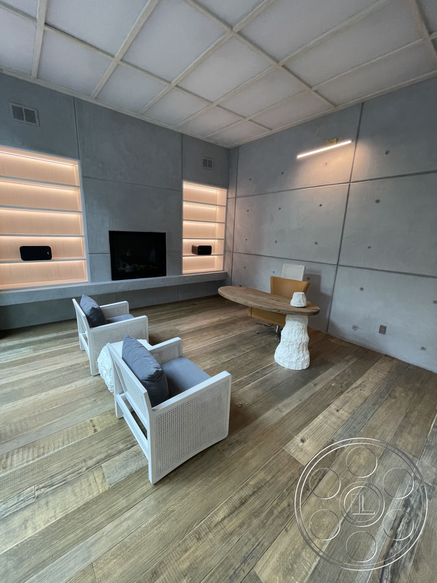 Modern 509 - neutral color palette interior, wood beam ceiling interior, exposed concrete walls interior, open concept living space interior, reclaimed hardwood living room floors, modern minimalist furniture interior, linear LED wall lighting interior, built-in floating shelves interior, steel-framed large window interior, minimalist round dining table interior, textured plaster wall finishes interior, contemporary upholstered armchairs interior, smooth concrete fireplace facade interior, natural wood accent table interior, soft gray accent colors interior