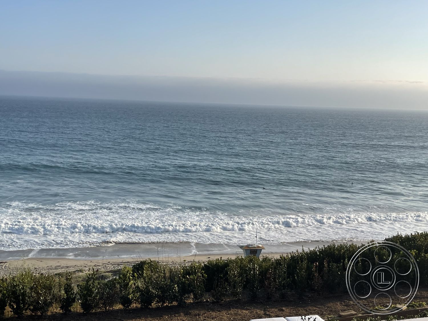 Modern 509 - clear blue sky, coastal landscape, sandy beach, outdoor relaxation area, horizon line, beachfront property setting, oceanfront view, lush beachfront vegetation, waves crashing on shore, sunny seaside environment