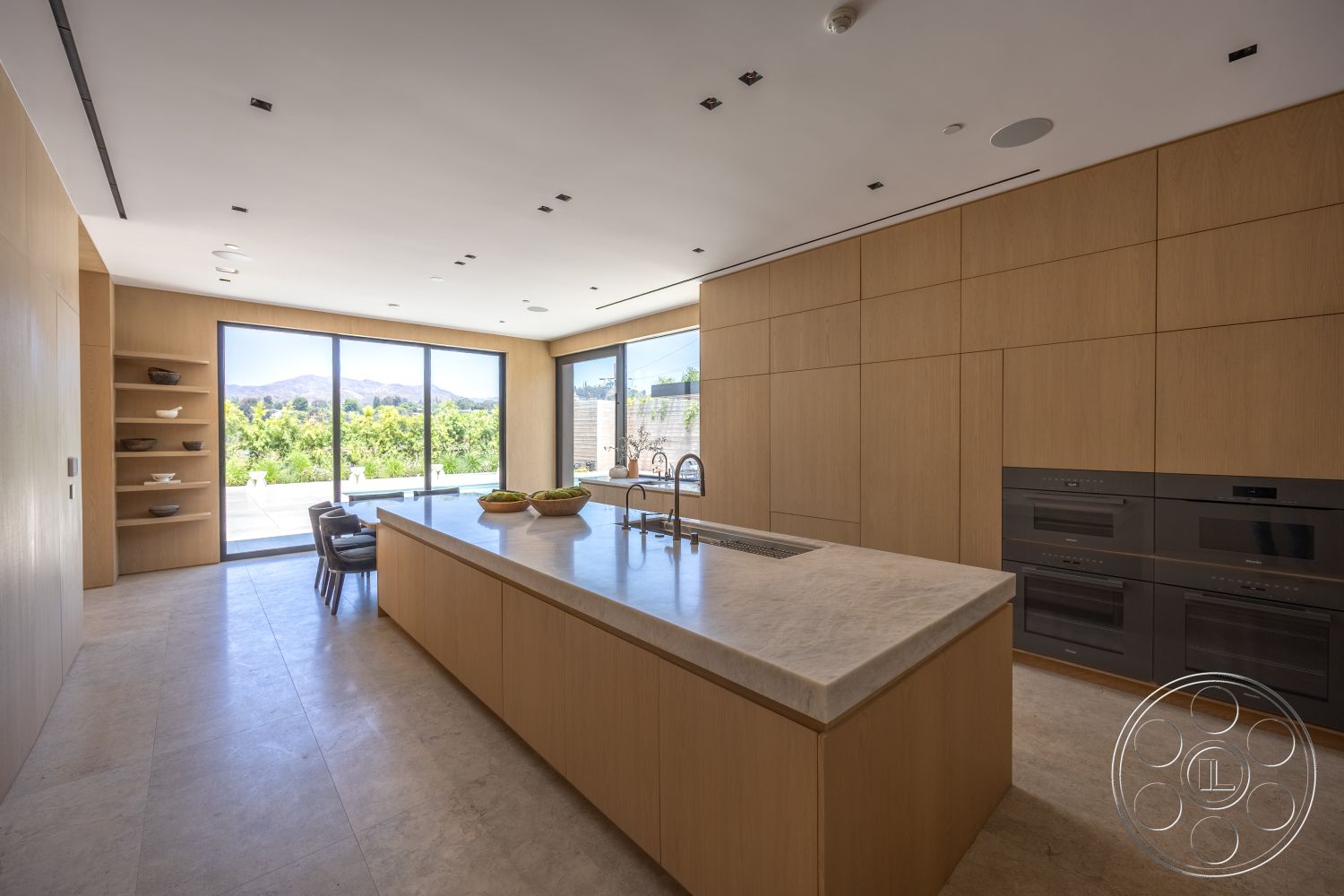 Modern 510 - kitchen, interior neutral color palette, interior floor-to-ceiling windows, interior recessed lighting fixtures, interior contemporary kitchen island, interior modern minimalist design, interior natural light from large windows, interior marble countertop, interior seamless indoor-outdoor flow, interior wood panel cabinetry, interior porcelain tile flooring, interior open-concept kitchen, interior sleek stainless steel appliances, interior organized pantry shelf, interior mountain view, interior elegant finishes
