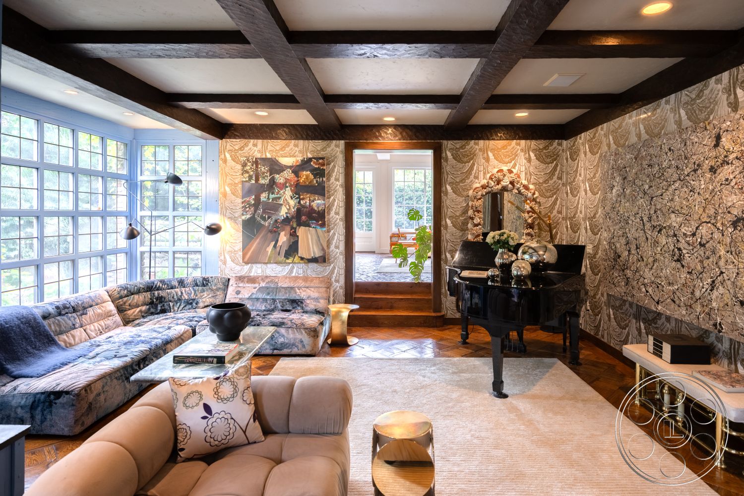 Mansion 2 - open floor plan, glass coffee table, decorative wall art, elegant lighting fixtures, stylish area rug, metal accent table, cozy sitting area, patterned throw pillows, exposed wood ceiling beams, hardwood flooring in living room, textured wallpaper accent wall, decorative floral arrangement, cohesive color palette, large paned windows, curved sectional sofa upholstery, black grand piano interior, brass and wood framed mirror, traditional interior style