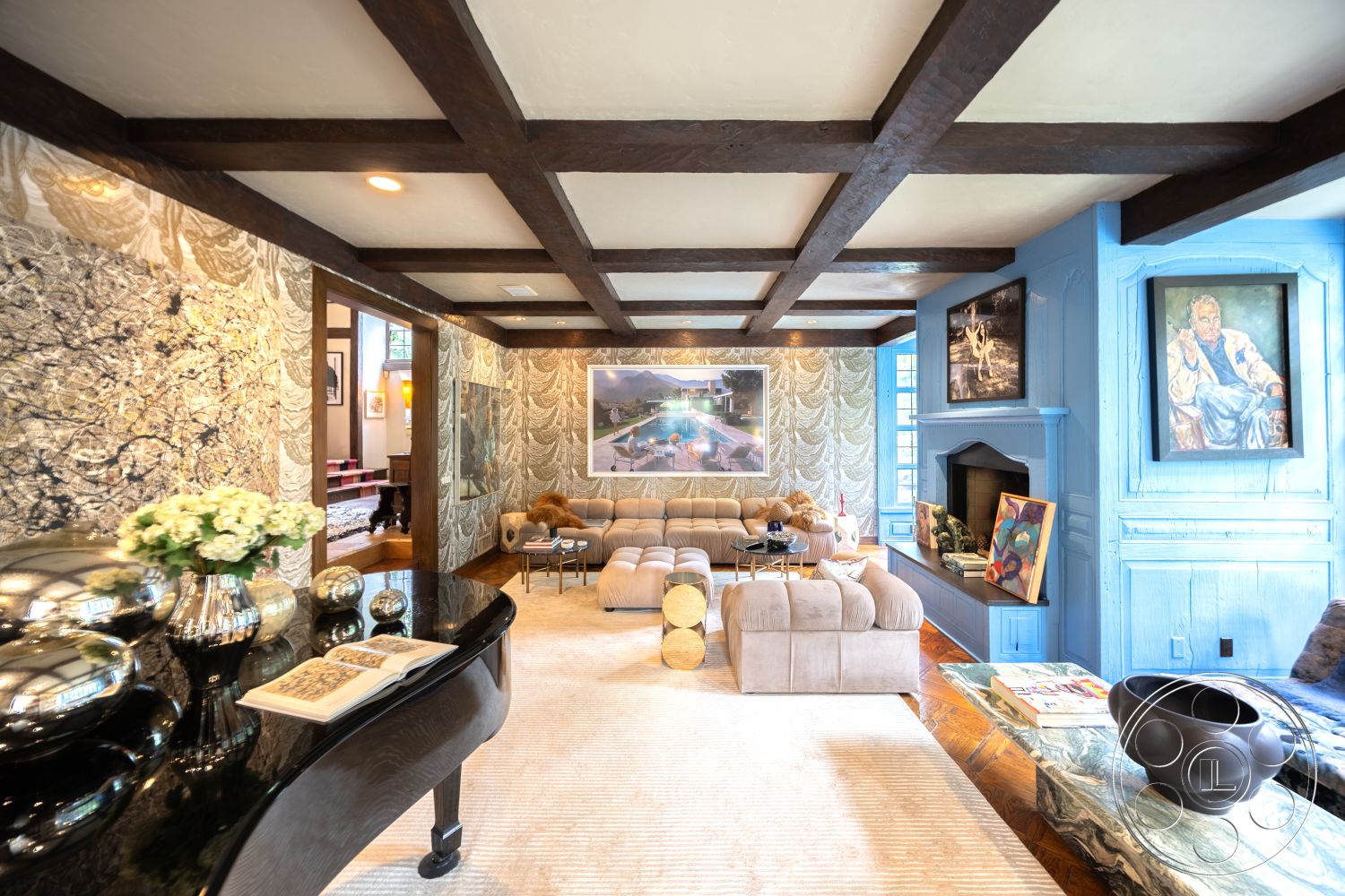 Mansion 2 - light hardwood flooring, multi-functional space, glass coffee table, elegant area rug, exposed wood ceiling beams, interior living room, textured plaster wall treatment, crown molding details, decorative wall mirrors, blue-painted accent wall, large framed art pieces, cozy sectional sofa, polished marble surface, traditional fireplace mantel, modern accent furniture