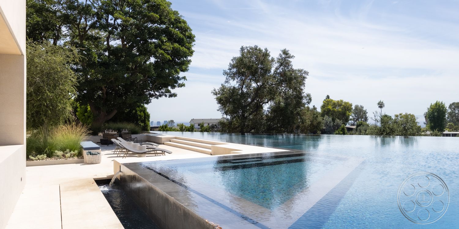 Modern 511 - metal outdoor furniture, urban skyline view, infinity pool, tiled pool deck, outdoor entertainment area, landscaped garden area, minimalist architectural style, concrete patio floor, surrounding green foliage, white stucco exterior walls, glass pool edge, built-in outdoor lounge seating