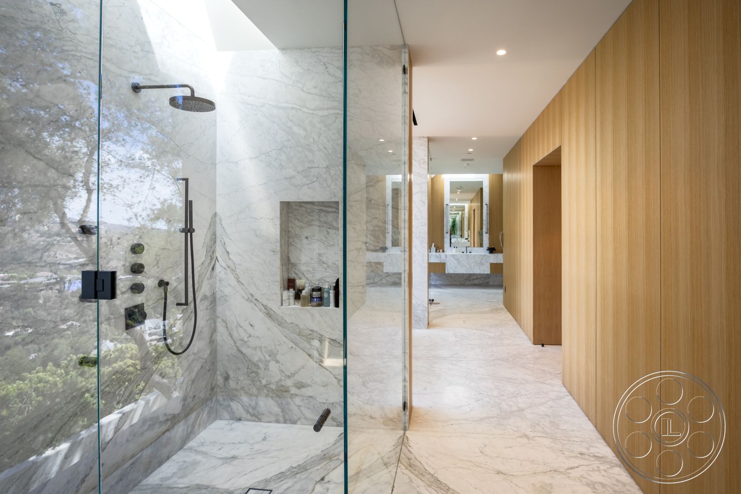 Modern 511 - neutral color palette, minimalist aesthetic, spa-like atmosphere, open concept layout, custom cabinetry, floor-to-ceiling glass, luxury interior, textured wall treatment, high-end materials, contemporary bathroom, glass shower doors, natural light integration, modern bathroom design, marble shower walls, marble bathroom flooring, solid wood paneling, enclosed shower area, sleek modern fixtures, clean lines design