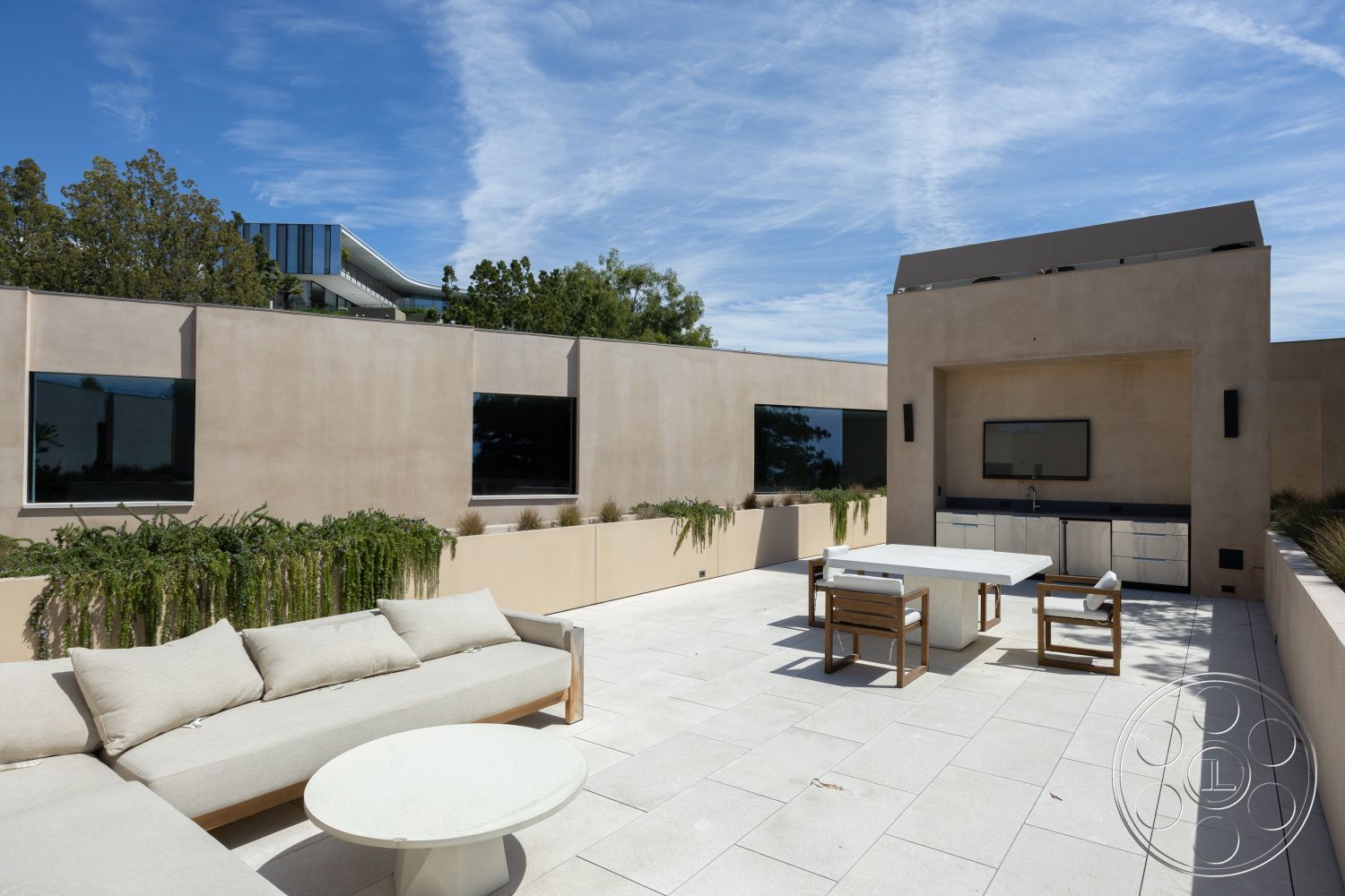 Modern 511 - minimalist design elements, city skyline view, open-air living space, white dining table, wooden dining chairs, stucco wall finish, sunny urban rooftop, exterior patio flooring, framed glass windows, modern outdoor entertainment area, large format porcelain tile patio floor, contemporary outdoor kitchen, stainless steel outdoor cabinetry, curved sectional outdoor sofa, lush landscaping with ferns, horizontal planters