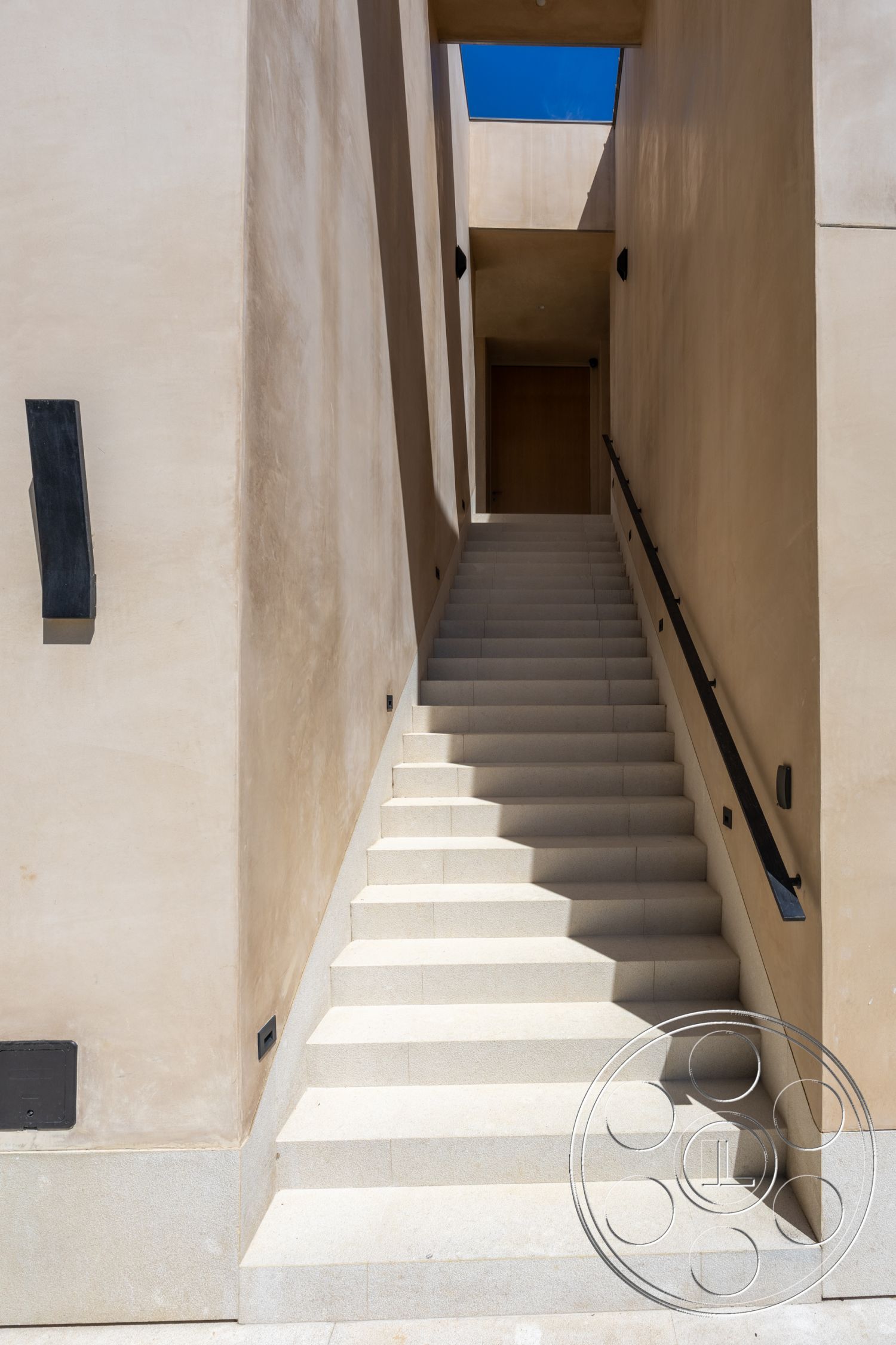 Modern 511 - neutral color palette, outdoor lighting fixtures, exterior stucco walls, minimalist architectural style, clean lines architecture, exterior concrete steps, natural light entry, straight staircase, sandstone steps, simple geometric design