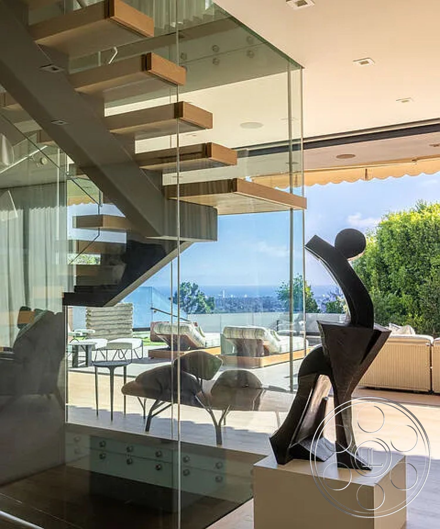 Modern 512 - bright natural lighting, open concept living space, luxury living room, modern lounge area, smooth concrete floor, panoramic ocean view, flat roof design, exposed wood ceiling beams, floor-to-ceiling glass walls, minimalist interior, city skyline view from interior, interior with outdoor connection, glass staircase with wooden treads, contemporary art sculpture, curved patio area, translucent glass doors