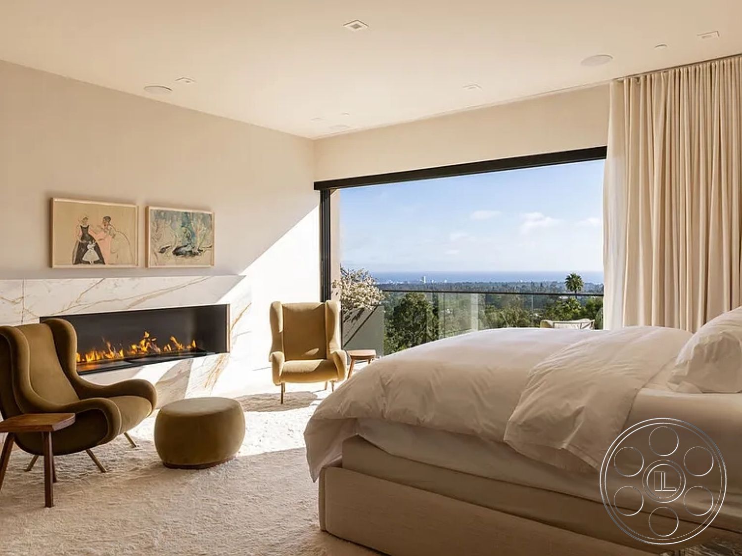 Modern 512 - minimalist decor, floor-to-ceiling windows, soft area rug, white bedding, ocean view, contemporary art on walls, textured wall finishes, large sliding glass doors, modern lounge chairs, interior bedroom, natural light-filled space, wooden furniture accents, marble fireplace surround, plush upholstered ottoman, cream colored curtains