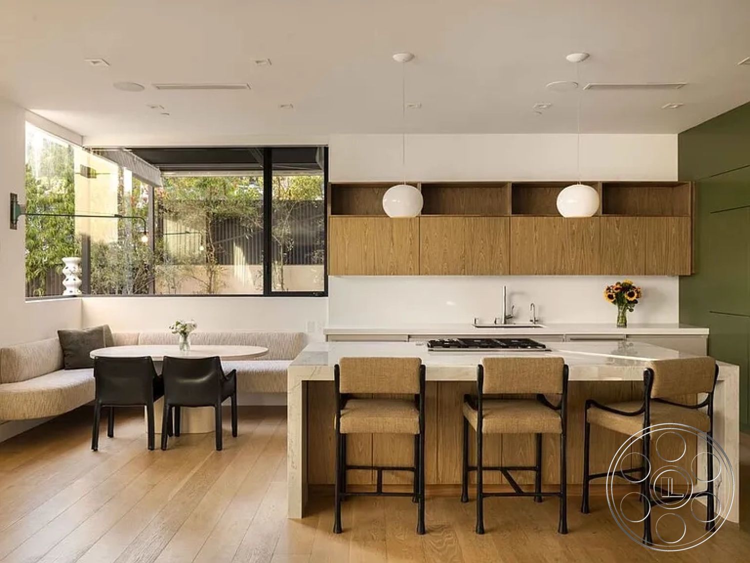 Modern 512 - light hardwood flooring, floor-to-ceiling windows, casual dining space, natural light from large windows, green accent wall, black metal bar stools, open-concept layout, modern dining area, interior kitchen design, minimalist pendant lighting, contemporary kitchen style, oak wood cabinetry, quartz countertop island, built-in banquette seating, white backsplash panel