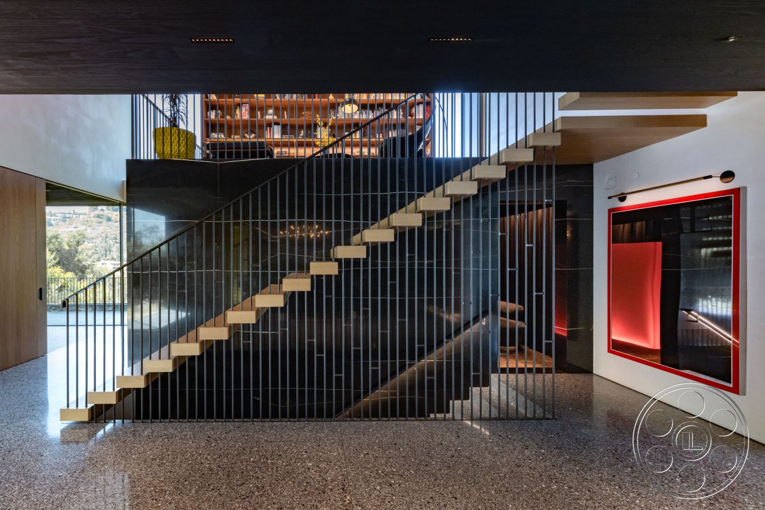 Modern 513 - minimalist decor, neutral color palette, contemporary design, polished concrete flooring, modern lighting fixtures, large glass windows, textured wall panels, built-in bookshelves, exposed wood ceiling beams, open concept living area, crown molding details, metal stair railings, natural light infusion, floating stairs, sectional seating area, black stone accent walls, sitting area with view