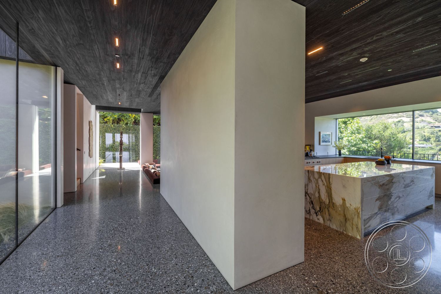 Modern 513 - interior textured plaster walls, interior floor-to-ceiling windows, interior marble kitchen island, interior polished concrete flooring, interior glass partition walls, interior seamless indoor-outdoor flow, interior natural light emphasis, interior dark wood paneled ceiling, interior contemporary open floor plan, interior exposed column design, interior minimalist architectural style, interior sleek modern detailing, interior stone accent features, interior linear lighting elements