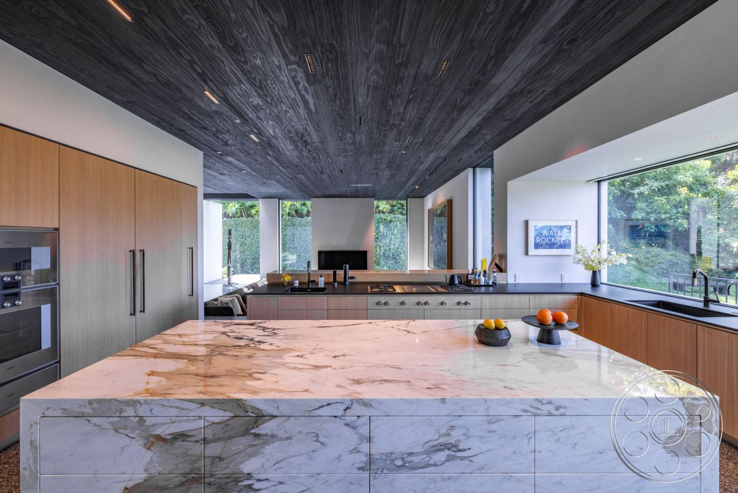 Modern 513 - open concept living space, large floor-to-ceiling windows, interior kitchen with marble countertops, minimalist kitchen design, integrated kitchen appliances, light hardwood cabinetry, exposed wood ceiling with dark finish, concrete flooring with polished finish, modern linear layout, natural light-rich environment