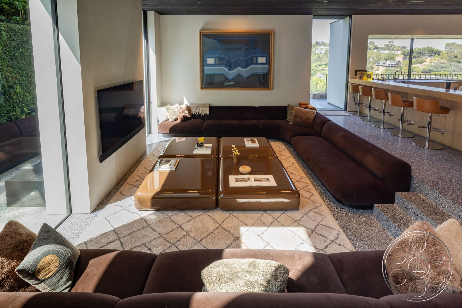 Modern 513 - modern pendant lighting, open concept living space, views of greenery, contemporary bar stools, natural light interior, neutral color palette interior, floor-to-ceiling windows interior, exposed concrete walls interior, contemporary architectural details, sliding glass doors interior, wood paneling ceiling, terrazzo flooring living room, curved brown velvet sectional sofa interior, glass wall exterior, modern coffee tables, minimalist artwork wall, textured area rug living room, integrated entertainment system, elegant accent pillows