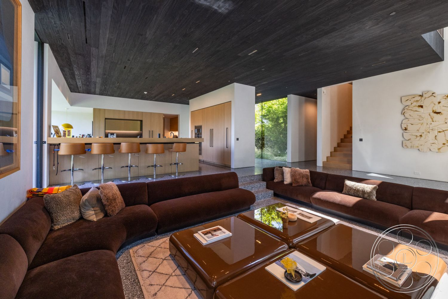 Modern 513 - neutral color palette, modern coffee table, geometric area rug, floating staircase, curved sectional sofa, recessed lighting fixtures, natural light through large windows, open floor plan design, textured wall art feature, built-in kitchen cabinetry, polished concrete surface, modern art accents, interior contemporary living room, dark wood plank ceiling, granite floor tiles, glass wall with garden view, stainless steel kitchen bar stools, minimalistic decor style