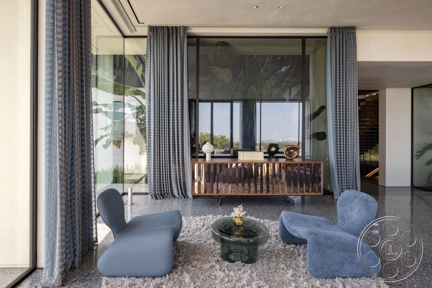 Modern 513 - modern architectural style, interior textured plaster wall, interior floor-to-ceiling windows, interior open floor plan, interior soft area rug, interior terrazzo flooring, interior geometric coffee table, interior modern furniture, interior natural light abundance, interior contemporary lounge chairs, interior glass wall details, interior patterned curtains, interior wood sideboard, interior stylish home decor