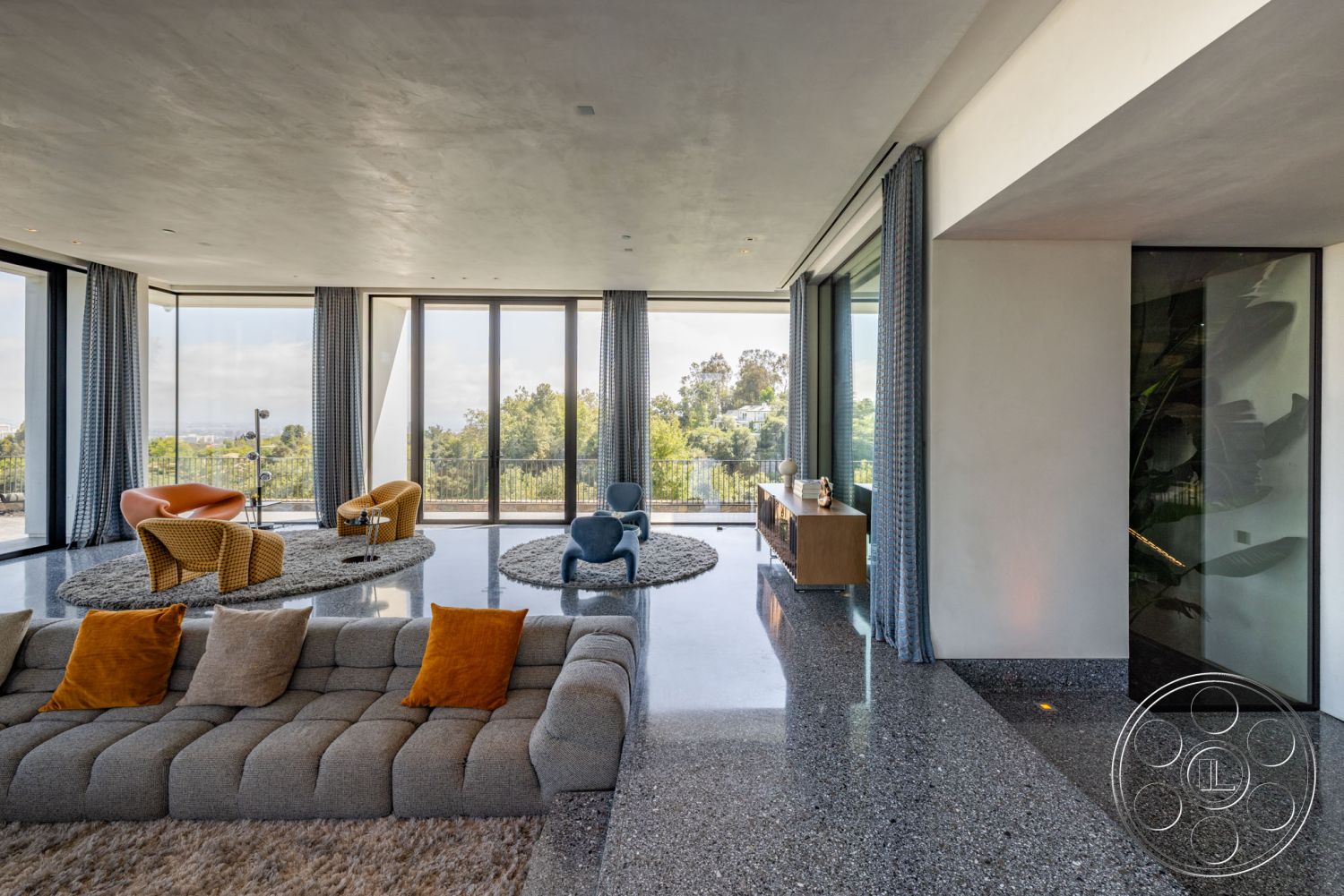 Modern 513 - minimalist decor, neutral color palette, natural light, terrazzo flooring, open concept layout, textured wall finish, floor-to-ceiling windows, geometric coffee table, luxury interior design, interior living room, modern sectional sofa, contemporary area rug, solid wood sideboard, curved accent chairs, sheer window curtains