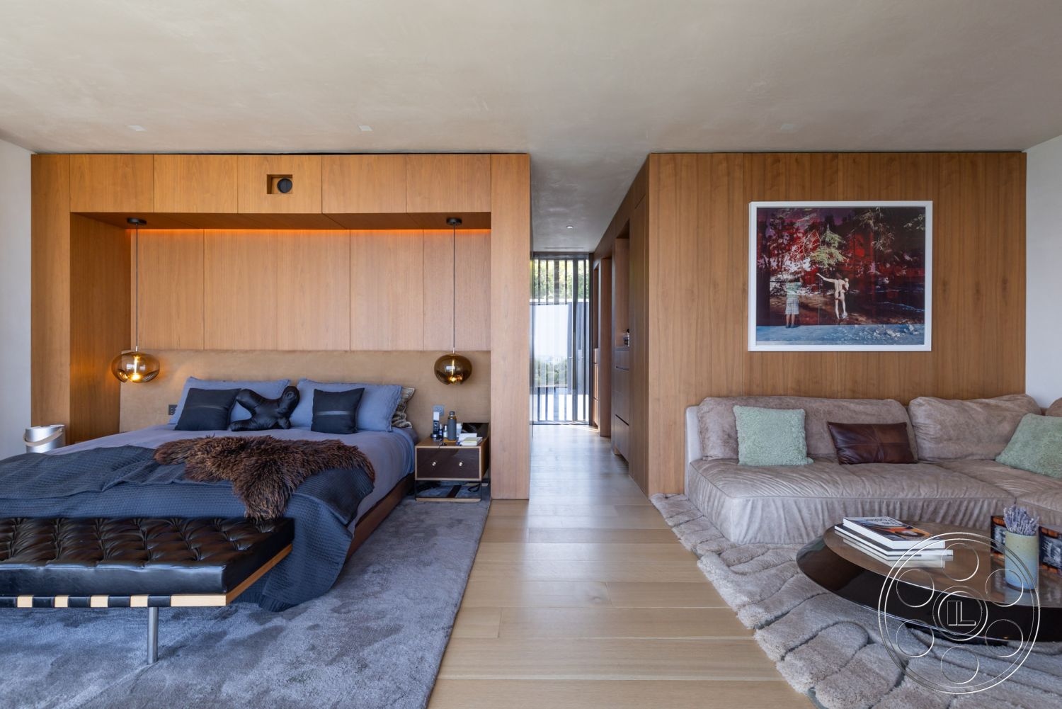 Modern 513 - minimalist decor, neutral color palette, recessed lighting, textured throw pillows, plush area rug, contemporary interior, hardwood bedroom floors, exposed wood panel wall, floating nightstands, modern artwork framing, low-profile platform bed, glass sliding door entrance, sunlit room setting, open layout bedroom, luxury apartment interior