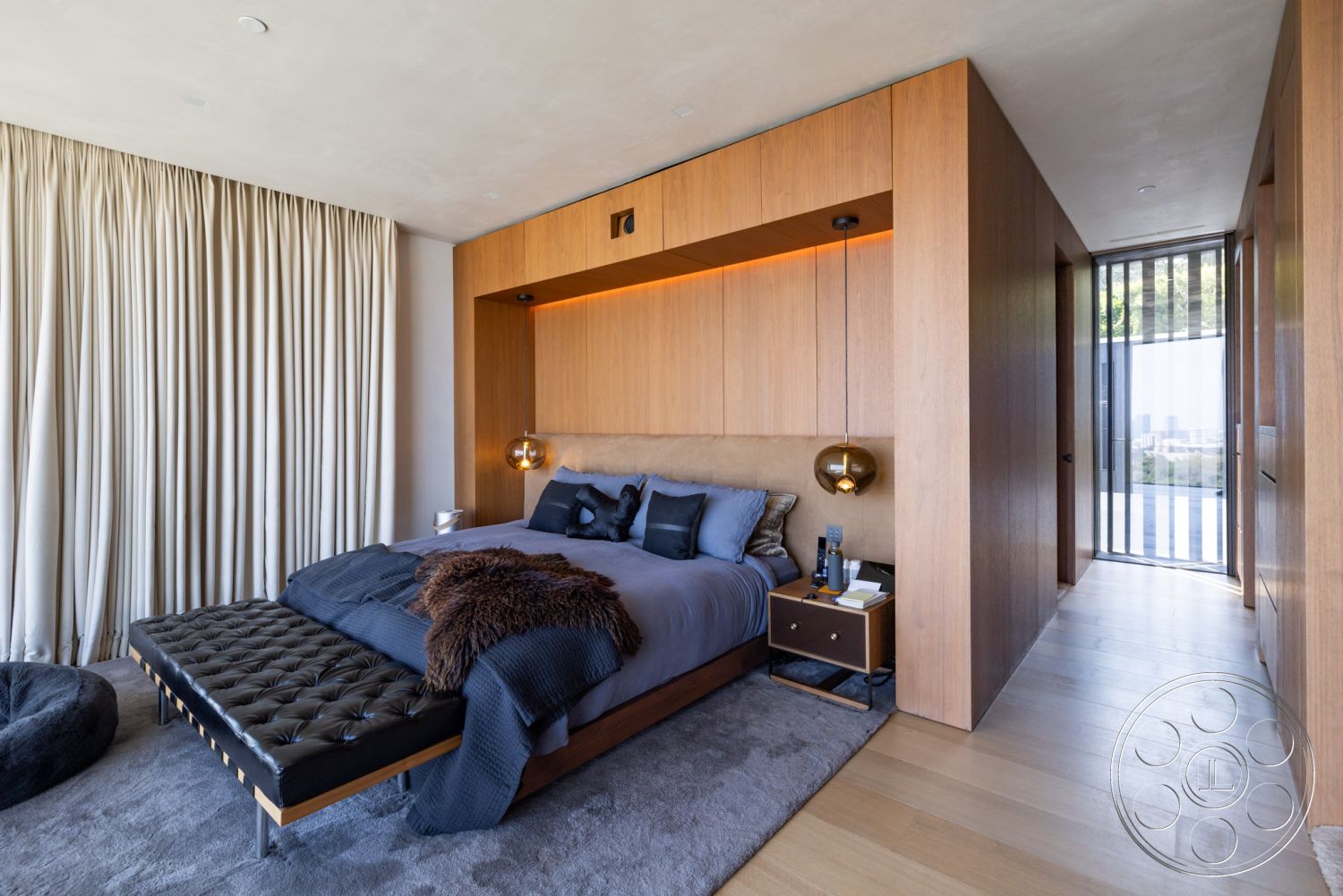 Modern 513 - neutral color palette, stylish decor accents, contemporary artwork, open floor plan, modern pendant lighting, floor-to-ceiling windows, plush area rug, textured throw blankets, minimalist interior design, hardwood bedroom floors, wood paneling accent wall, interior lighting fixtures, sofa lounge area, modern bedside table, curtained window treatments, coved ceiling lighting, luxury bedding materials, spacious room layout