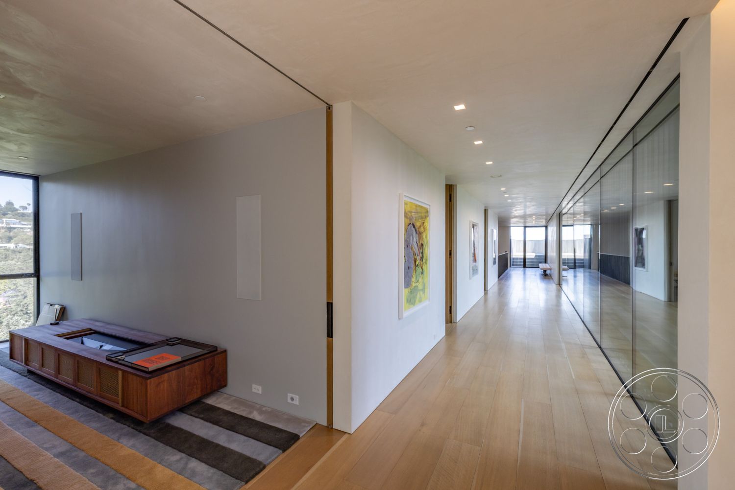 Modern 513 - interior recessed lighting, interior natural light, interior hardwood flooring, interior modern art decor, interior minimalist design, interior spacious layout, interior wood accent wall, interior glass wall panels, interior concrete wall finish, interior sleek furniture design, interior wall art display, interior open hallway, interior low-profile furniture, interior ceiling with smooth finish