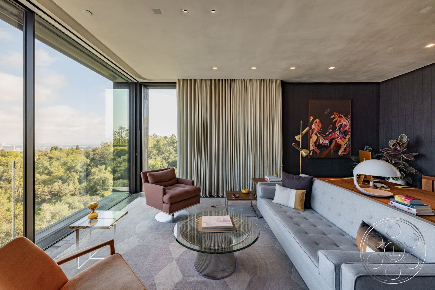 Modern 513 - mid-century modern style, elegant lighting fixture, natural light interior, hardwood flooring living room, open floor plan design, outdoor greenery view, exposed concrete ceiling interior, glass wall panels interior, customized wood accent wall interior, minimalist coffee table glass, upholstered armchair contemporary, textured fabric curtains light grey, modern art painting wall decor, geometric area rug soft tones, scenic nature view exterior