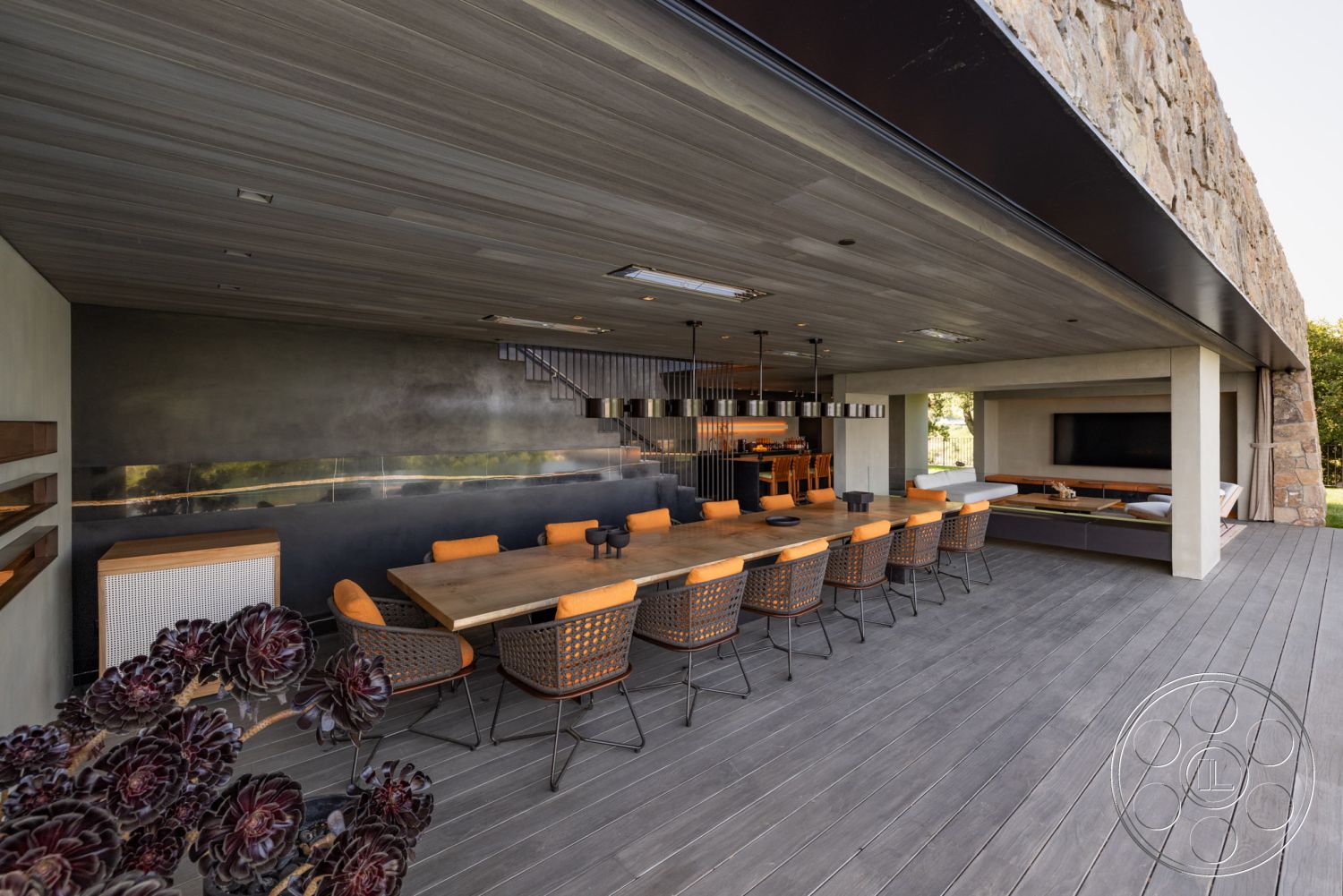 Modern 513 - neutral color palette, open concept layout, wood dining table, integrated lighting, contemporary design elements, modern architectural style, hillside view, woven outdoor chairs, deck flooring, sustainable building materials, textured stone feature wall, wood plank ceiling, sliding glass patio doors, lush outdoor landscaping, urban outdoor setting, exterior dining area, concrete wall backdrop, glass side partition, oversized outdoor sofa, decorative succulents