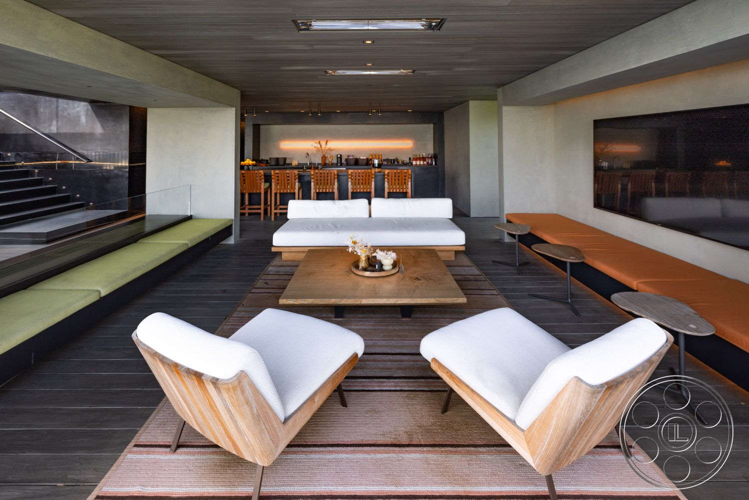 Modern 513 - neutral color palette, textured area rug, sliding glass doors, modern coffee table, concrete walls, floor-to-ceiling windows, contemporary design elements, recessed lighting fixtures, minimalist decor style, interior lounge area, wood plank ceiling, kitchen island with seating, indoor-outdoor living space, hardwood floor boards, L-shaped sectional sofa, natural wood accent chairs, glass partition railing, open concept kitchen view, built-in bar area, hidden lighting in ceiling