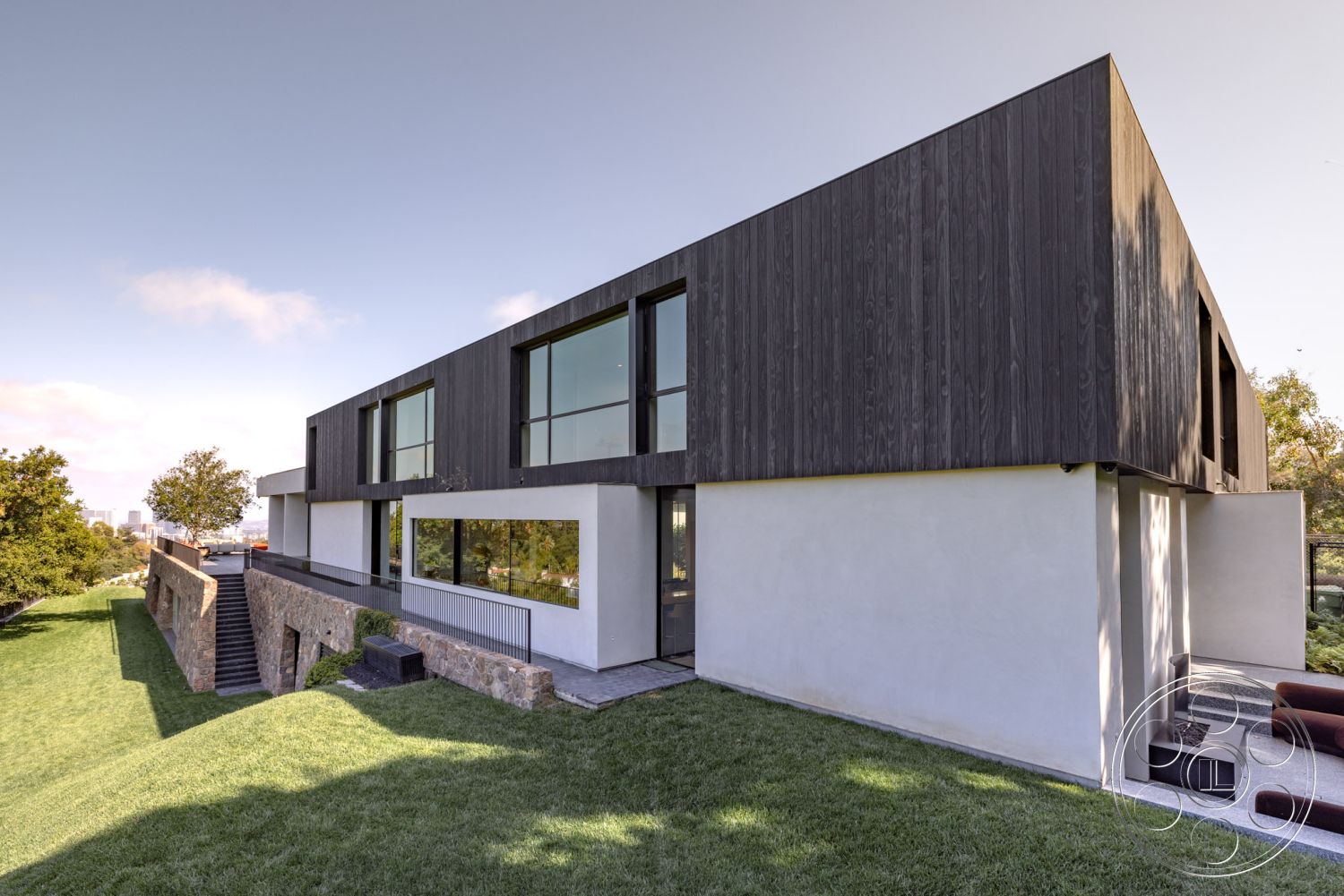 Modern 513 - exterior, contemporary design, minimalist style, large floor-to-ceiling windows, slate stone steps, open floor plan concept, urban hillside location, stucco wall finish, natural light emphasis, concrete patio floor, wood panel exterior cladding, landscaped grassy area, rectangular modern architecture