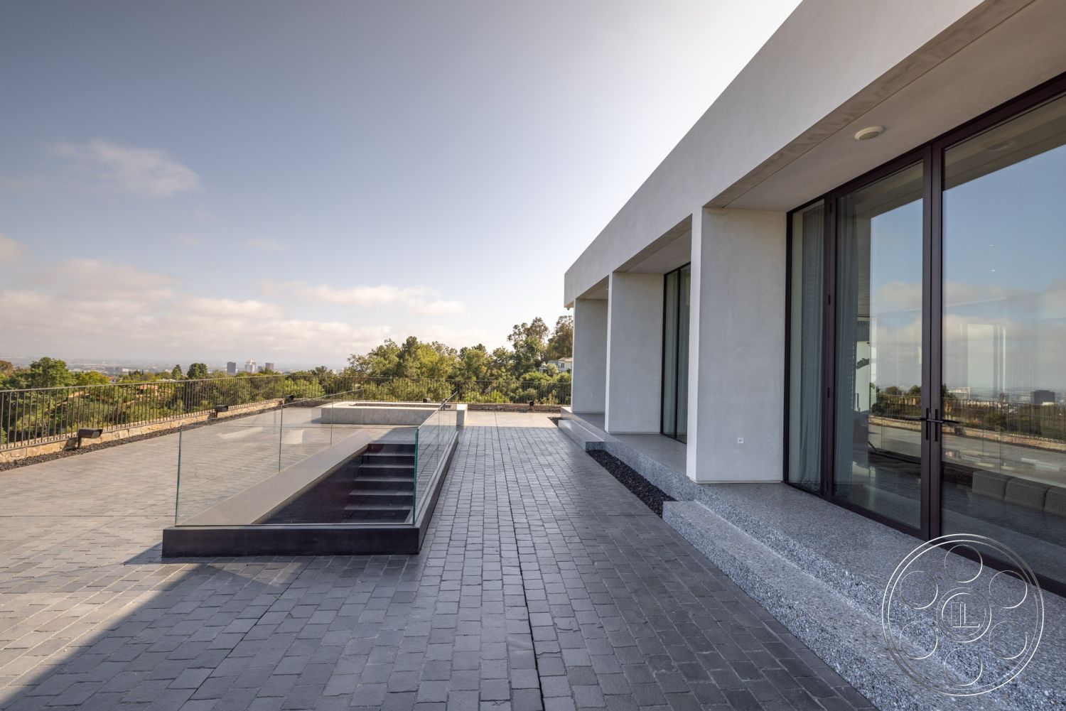 Modern 513 - exterior concrete walls, exterior glass railing, exterior city skyline view, exterior hillside location, exterior minimalist architectural style, exterior glass floor-to-ceiling windows, exterior concrete pool stairs, exterior paver patio flooring, exterior granite composite pool border, exterior linear pool design