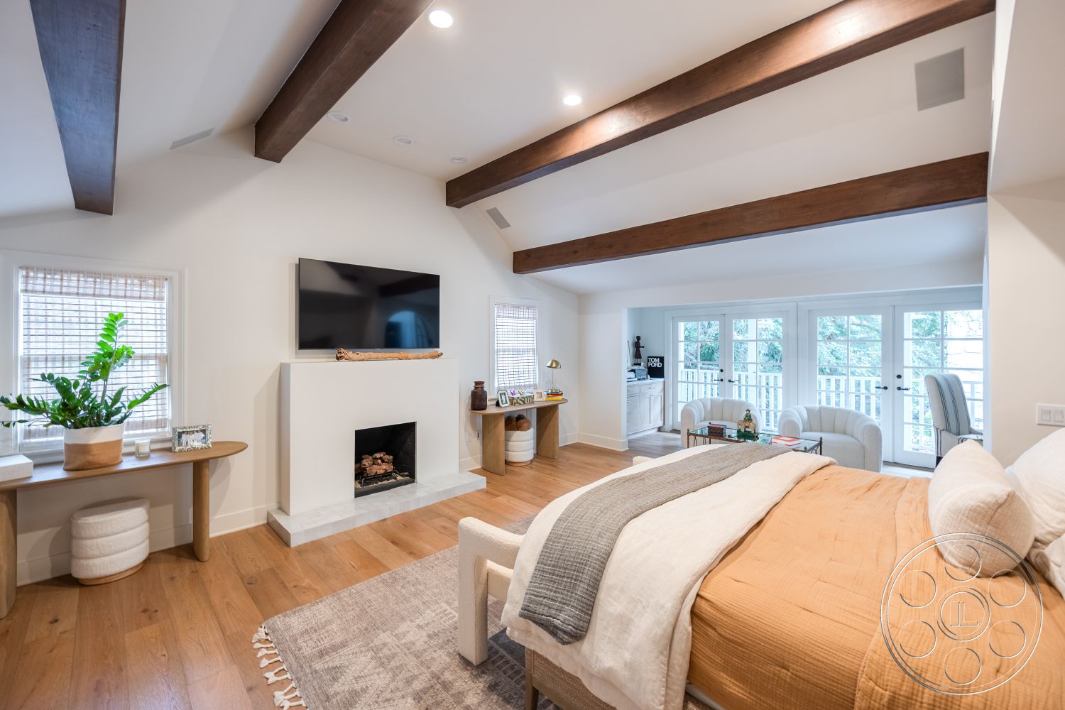 Americana 201 - minimalist decor, neutral color palette, natural light, textured area rug, open layout, floor-to-ceiling windows, contemporary design elements, exposed wood ceiling beams, hardwood bedroom floors, white painted walls, modern fireplace surround, cozy master bedroom, stylish home office space, seating area by window