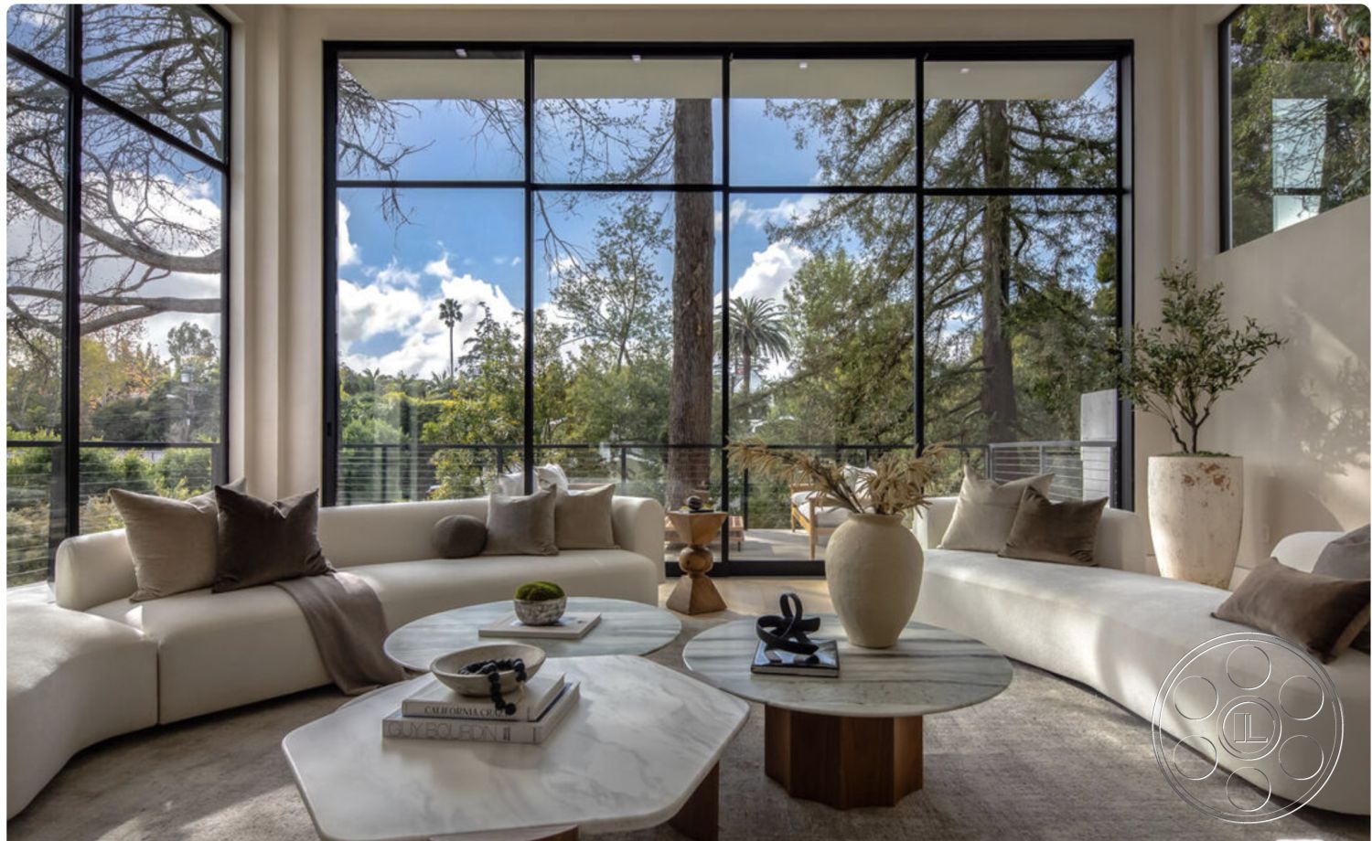 Modern 514 - interior neutral color palette, interior natural light, interior decorative vase, interior minimalistic design, interior open floor plan, interior concrete flooring, interior accent pillows, interior marble coffee table, interior glass walls, interior framed artwork, interior large windows, interior geometric shapes, interior curved sectional sofa, interior soft textiles, interior plants decor