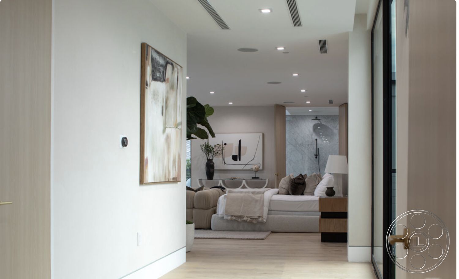 Modern 514 - neutral color palette, hardwood flooring, decorative pillows, open concept layout, floor-to-ceiling windows, comfortable bedding, textured throw blanket, light wood paneling, designer lamp, contemporary light fixtures, artistic vases, recessed ceiling lights, bedroom area, stylish nightstand, modern sofa, white painted walls, interior corridor, marble bathroom wall, modern furniture accents, minimalist art wall decor, large plant decoration