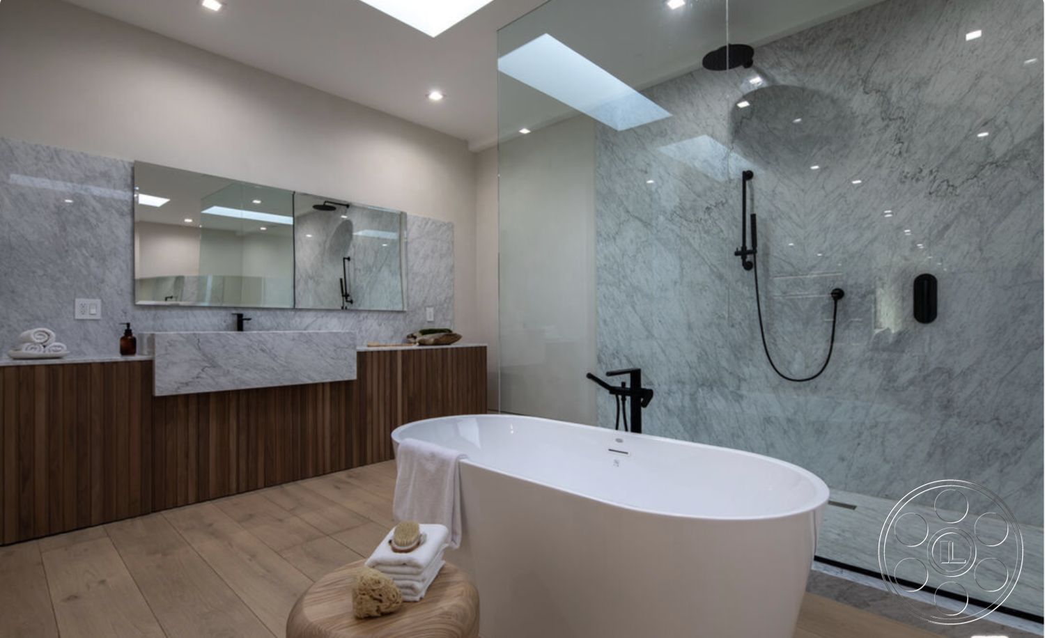 Modern 514 - interior recessed lighting, interior hardwood flooring, interior minimalist design, interior marble bathroom walls, interior marble shower enclosure, interior spa-like atmosphere, interior wood vanity with marble countertop, interior freestanding bathtub, interior black shower fixtures, interior mirrored wall with backlighting, interior wood paneling on cabinetry, interior skylight, interior tufted stool